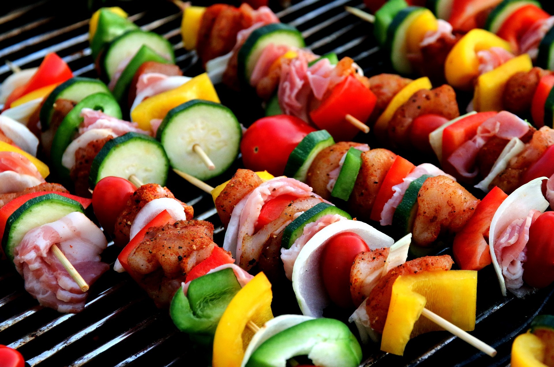 A row of colourful kebabs, with chicken, bacon, courgette, and an assortment of peppers  Click the picture, or the link below, to go to our personal injury solicitors’ no win no fee food contamination claims page.